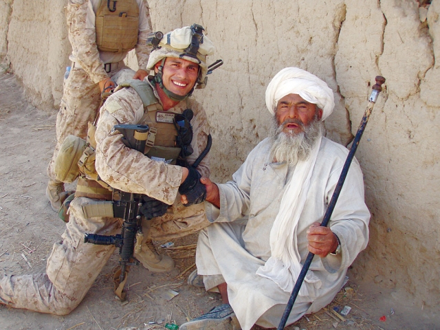 Captain Marcos A. Ruvalcaba pictured with an Afghanistan man during his deployment.