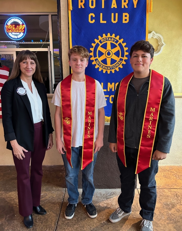 A few years ago, Rotarian Kelli Couse and her husband realized, after attending graduation, that students going into the military were not recognized so they decided to do something about it. Kelli introduced two students who will be going into the military and presented them with military sashes, they will wear at graduation. These two are Aiden Dawson and Marcos Jimenez; they are both going into the US Marines. Pictured (l-r) is Rotarian Kelli Couse, Aiden Dawson, and Marcos Jimenez. Photo credit Martha Richardson.