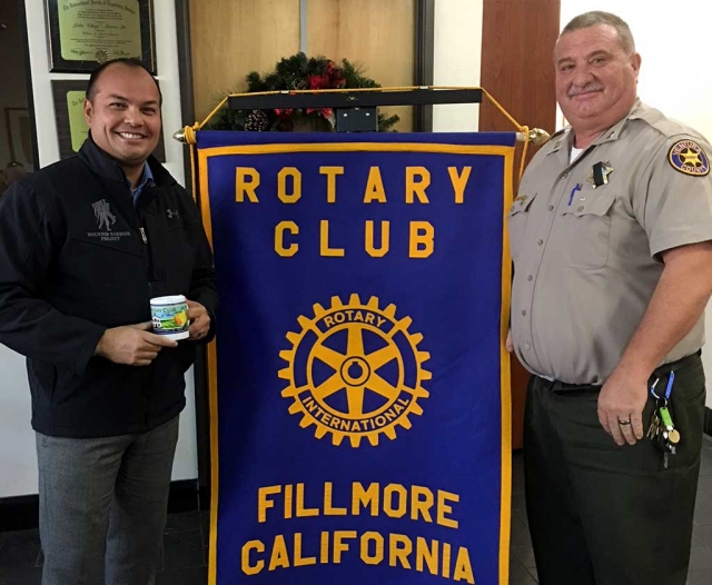 Fillmore Rotary member Dave Wareham (right) presented a mug to Highway Patrol Lieutenant and Agency Operations Officer Dave Songer, after Songer spoke to the club on how to be prepared for emergencies. Songer also does Threat Assessments for schools and churches. Photo courtesy Martha Richardson.
