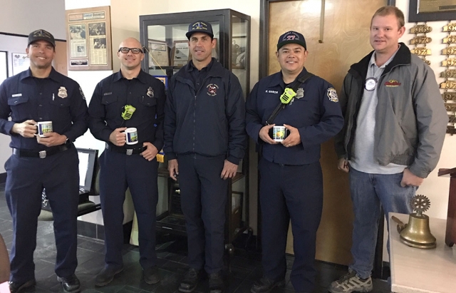 Pictured far right is Fillmore Rotary President Andy Klittich presenting a Rotary mug to the firemen who spoke at last week’s meeting about the new County Fire Station, currently in progress. This station will have six bays for trucks, fire and rescue, sleeping room, kitchen and a training room. They will be able to hold all of their training and drills there instead of having to travel to other stations. It will also have available space for staging in case of a large fire. When they do move from the Old Telegraph Road station they will lease it to the Forest Service. Photo courtesy Martha Richardson.