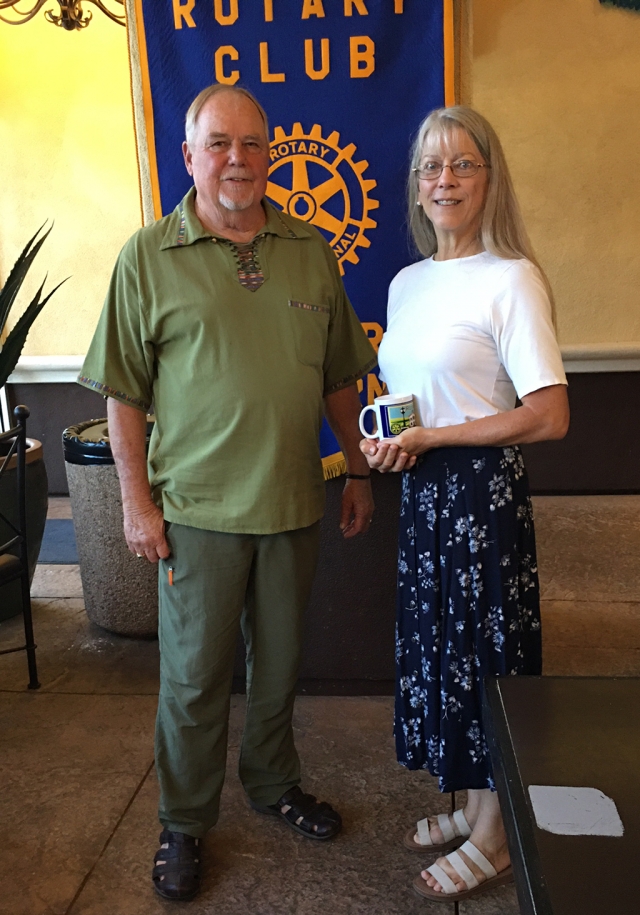 (l-r) Rotary President Dave Anderson with Sue Poland from California Women in Agriculture. The Rotary speaker last week was Sue Poland from California Women in Agriculture (CWA). CWA began in Ventura County in 1976, by Kay Wilson-Bolton and Carol Leavens. The mission is for California agriculture to be protected for future generations by educating consumers, policy makers and their members. They have a strong commitment to education and agricultural awareness. Some of their activities are Farm Day where they go to a school and bring farm animals to educate students, Ag in the Classroom which informs teachers about Ag and how they can incorporate it into lessons, and they have a booth at the Ventura County Fair to educate the public. The main focus is on what we all have in common—we all eat food! Where does it come from? Who grows it? What all is involved in the process of California farming and how can it continue for generations to come? Photo credit Rotarian Martha Richardson.