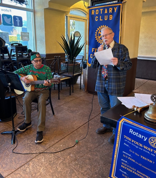 Pictured are Rotarians Joe Aguirre and Bob Hammond who donned their Christmas clothes, guitar and mic, and led everyone in Christmas Carols at last week’s Rotary Club meeting. It was very entertaining and got everyone in the Christmas Spirit. Photo credit Rotarian Martha Richardson.