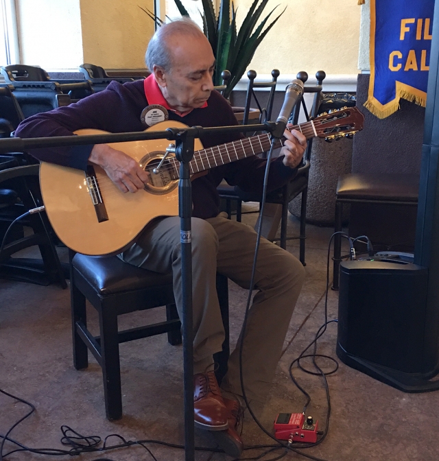 Pictured is Rotarian Joe Aguirre who gave a Fillmore Rotary program which began with his background, growing up in Fillmore. After graduating from Ventura and UC Irvine, he decided he wanted to get into music and attended Cal Arts. He is very talented on the guitar and taught the Club about how the different notes blend together to make different sounds, and the strumming creates different styles of music. He said music creates an emotion in us and affects our lives. It makes us remember where we were when we heard a particular song for the first time. When asked why he didn’t go into teaching music or performing, he jokingly answered if he did that, he wouldn’t be able to help us over 65’s with our Medicare at Aguirre Financial & Insurance Services. Joe began his business service 1990 but continues practicing music several hours each day. Photo credit Rotarian Martha Richardson.