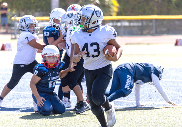 Pictured right, action from the Bantam game. Photo credit Crystal Gurrola.
