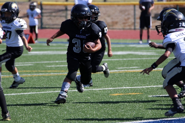 Below are the Fillmore Raiders game results for this week of Saturday, September 8th: Raiders Mighty Mites Black (home game) vs. Mighty Mite Camarillo 20-6, Raiders. Raiders Mighty Mites Silver (home game) vs. Mighty Mite Grace Brethren Red 38-20, Grace Brethren. Raiders Bantams (home game) vs. Bantam SC Wildcats 0-6, Wildcats. Raiders Sophomores (home game) vs. Oxnard 14-0, Oxnard. Raiders Juniors (away game) vs. Saugus 36-22, Saugus. Raiders Seniors (away game) vs. Saugus 40-20, Saugus. Next weeks games are set for September 15th: Raiders Might Mites Black vs. Mighty Mite Valley Thunder 8am at Fillmore High School. Raiders Mighty Mites Silver vs. Mighty Mites Saugus Silver 10am at Saugus High School. Raiders Bantams vs. SC Grizzles 10am at Golden Valley High School. Raiders Sophomores vs. Camarillo 12pm at Rio Mesa High School. Raiders Juniors vs. Carpinteria 12pm at Carpinteria High School. Raiders Seniors vs. Newbury Park 2pm at Newbury Park High School. Photos by Crystal Gurrola.