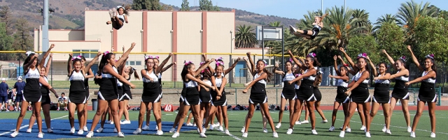 Jr.2 and Jr. 1 Raiders Cheer perform together