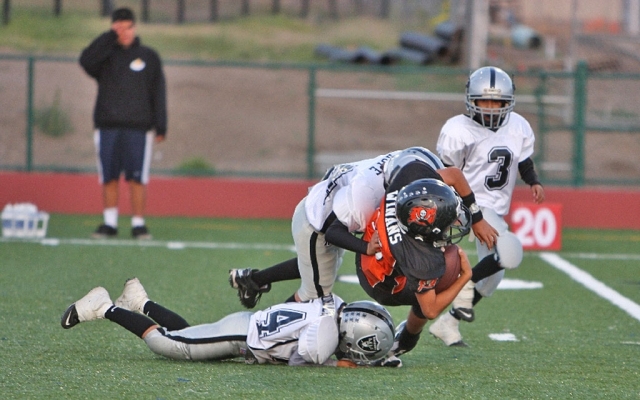 Chad Hope puts a big hit on a Ventura ball carrier.
