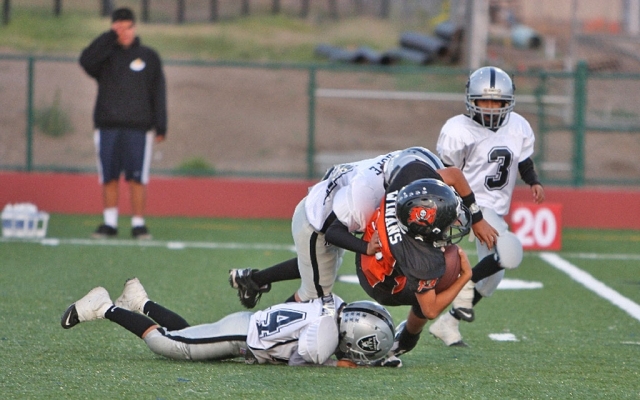 Chad Hope puts a big hit on a Ventura ball carrier.
