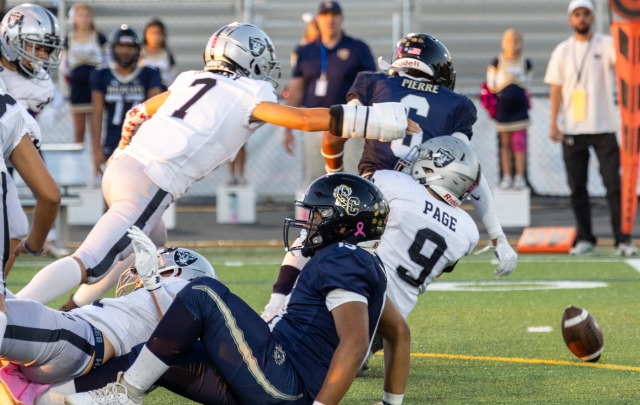 Pictured above is Fillmore Raiders Seniors Black taking on Santa Clarita Wildcats. Above are the Raiders trying to recover the loose ball. Raider lost to the Wildcats, 30–0. Photo credit Crystal Gurrola. 