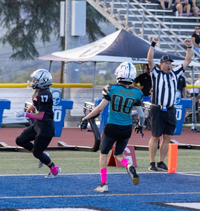 Above is Raiders Senior #17 making his way past the 101 Jag Teal defense, scoring a touchdown in last Saturday’s Homecoming Game. Photo credit Crystal Gurrola