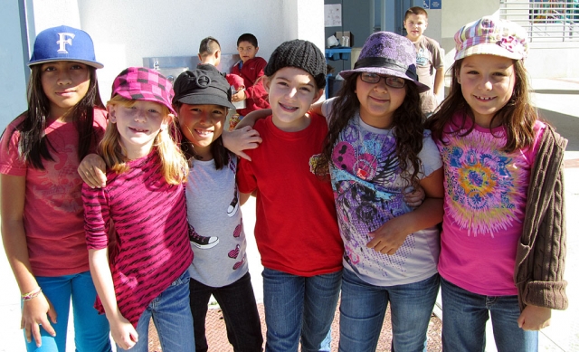 Mountain Vista students Stephanie Romero, Maddie Davis, Lexie Garza, Jillian Graves, Liliana Contreras, and Anahi Nuno show their Red Ribbon Week spirit by “Putting a Cap” on drugs.