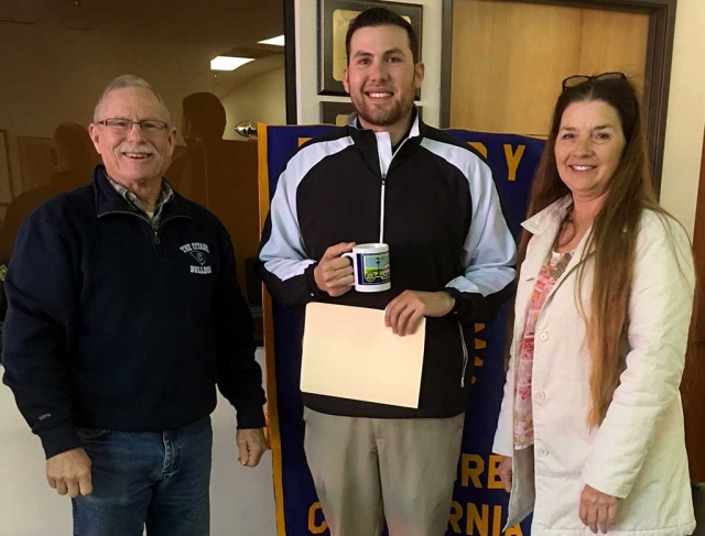 Bob Hammond, Program Chair introduced Tim Medina a FHS graduate who now works at Elkins Golf Course. Tim talked about what it takes to become a PGA Teaching Pro. President Julie presented him with a Rotary mug.