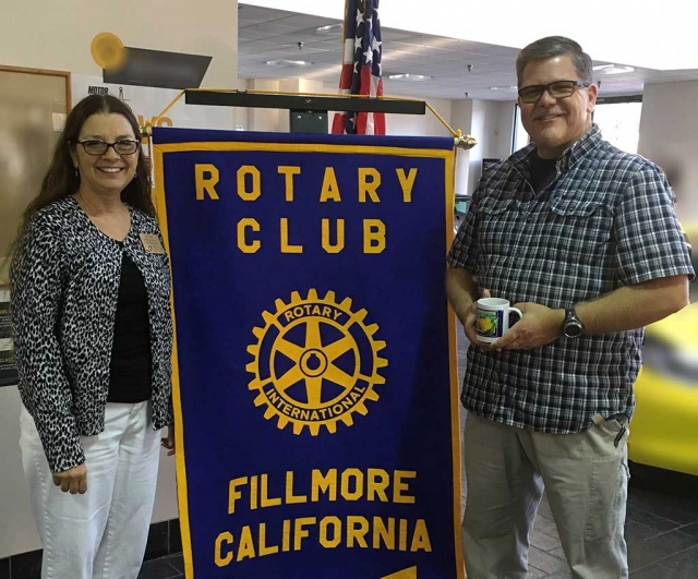 Rotary President Julie Latshaw presented a Rotary mug to Sergeant Kevin Vaden. He informed the Club about the Public Safety Day/Bicycle Rodeo which will be held at the Fillmore Middle School, on September 24, from 9-12. It will be an enjoyable event for children and adults.