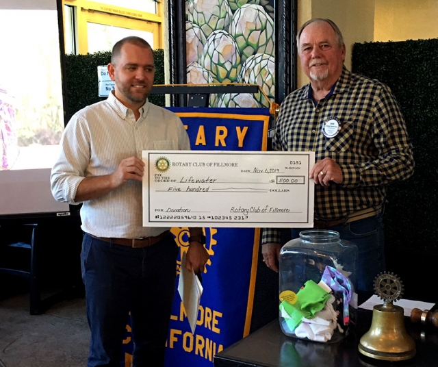 Pictured (l-r) is Tyson Babayco speaker from Lifewater with Rotarian Dave Andersen, International Chairman. Tyson Babayco, from Lifewater, began his program with this announcement, “every 60 seconds a child dies from water borne diseases”. The video showed a dirty water stream that women walked miles to collect and take home to drink and cook with. Now with the help of the Lifewater Organization, which began 40+ years ago, water wells are dug, personal hygiene and sanitation lessons have been taught and lives have changed in 45 countries. The five lessons that are taught in each village are cleanliness using a table to wash their hands, a latrine, storing clean water safely in closed containers, using drying racks for dishes and cleaning their compounds. The communities using these practices are now flourishing. The Rotary Club of Fillmore donated $500 to this organization. Photo courtesy Martha Richardson.