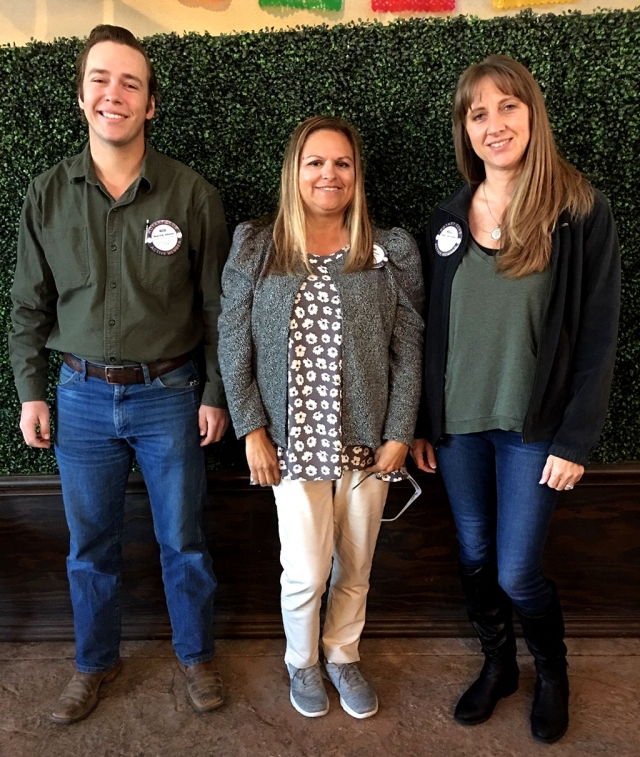 Rotary welcomes their new members Nick Johnson (left) and Kelli Couse (right) who we’re presented with Rotary badges by Rotary President Ari Larson (center). Photo Courtesy Martha Richardson.