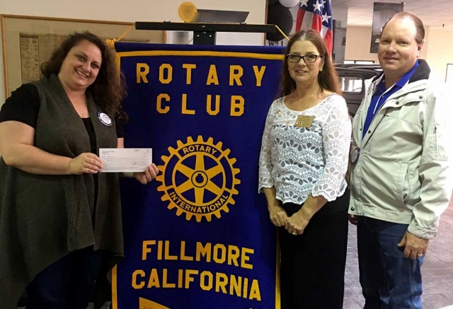 Fillmore Rotary presented a check for $500 to Kate English for One Step A La Vez.