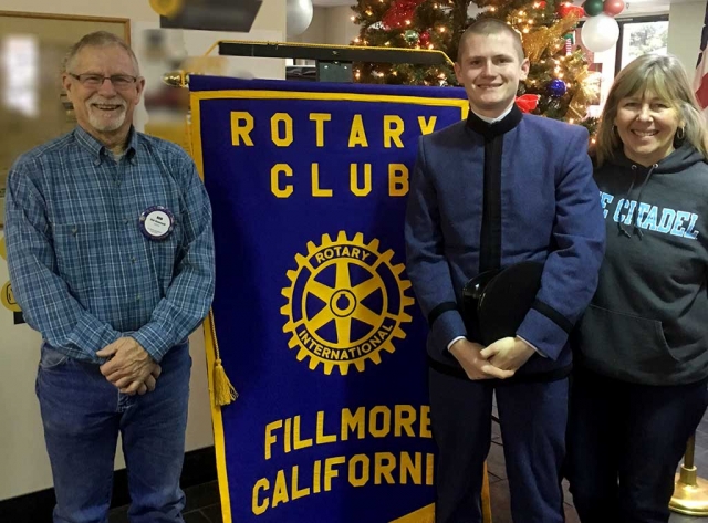 Rotarian Bob Hammond, son Matthew visiting from the Citadel, and Mother Lisa stop for a Family photo to celebrate the holiday’s.