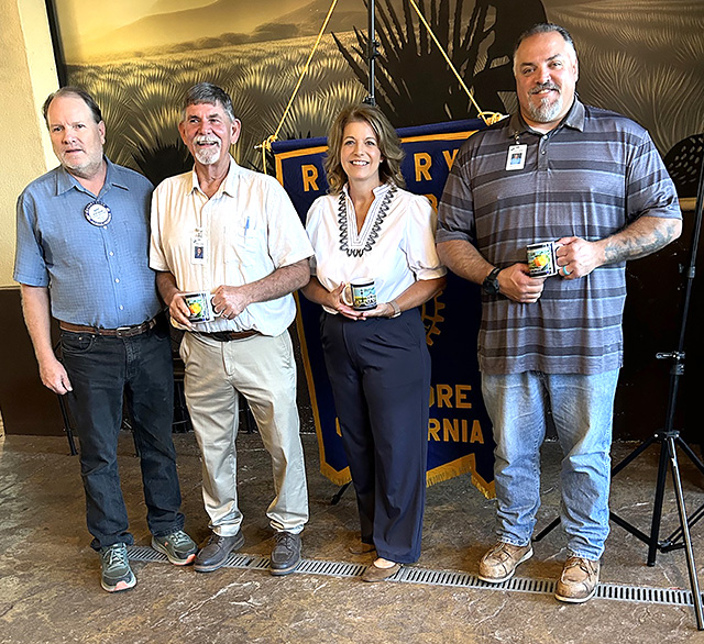 Pictured from left are Rotary Club Past President Scott Beylik, presenting mugs to guest speakers RJ Stump, Denise Berrington, and Kevin Schmitz. Photo credit Martha Richardson.