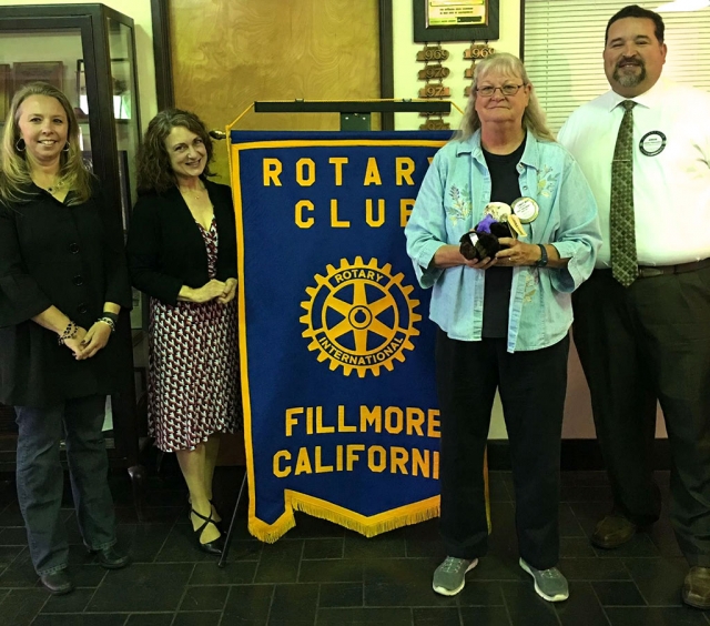 Holly Harvan, Director of Early Childhood Education, Micheline Miglis, Assistant Superintendent of Education Services, and Adrian Palazuelos, Rotarian and Superintendent of Fillmore Schools presented Cindy Blatt with a toy otter holding a star, for all she did to make the Josh the Otter project a success.