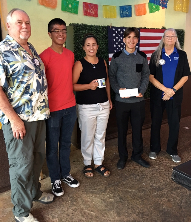 (l-r) New Rotary President Dave Andersen, Diego Ramirez, Kim Tafoya, Kobe Lizarraga and Swim Coach Cindy Blatt. Kim Tafoya, FHS Athletics Director and coach for Cross Country, Girls Basketball and Track &Field was the speaker at Fillmore Rotary’s meeting last week. She has been teaching for 18 years and coaching for 17 of those years. Kim is very dedicated to the students not only in athletics, but in academics as well. Two of the athletes were present also, Diego Ramirez and Kobe Lizarraga. Photo credit Martha Richardson.