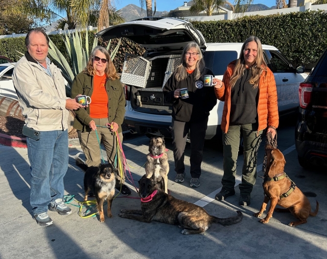 Pictured (l-r) are Fillmore Rotary President Scott Beylik, Deresa Kenney, Lisa Hammond, and Virginia Feyh, along with their K9 friends receiving their Rotary mugs. Photo credit Rotarian Martha Richardson. 