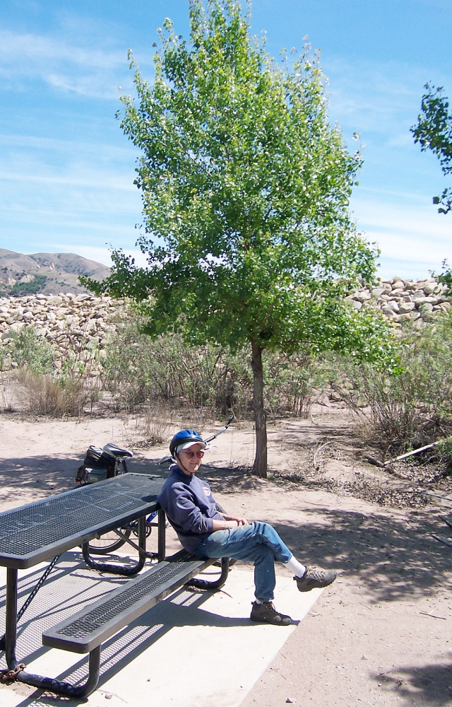 Above, Roy Arnold sitting at the picnic table area he designed near the Sespe Creek Bike Path.