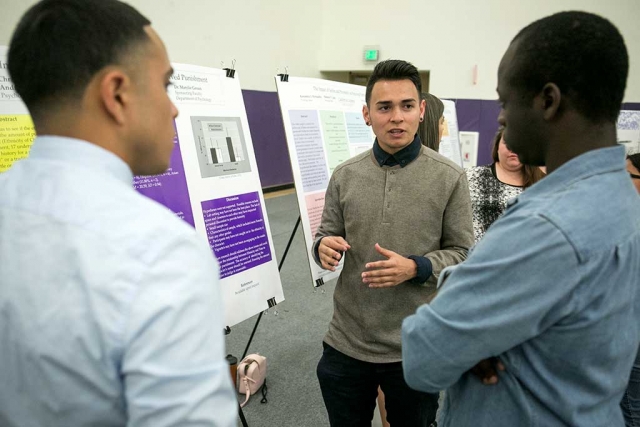 Andres Mendoza of Oxnard sharing his psychology research during the 2016 Festival of Scholars