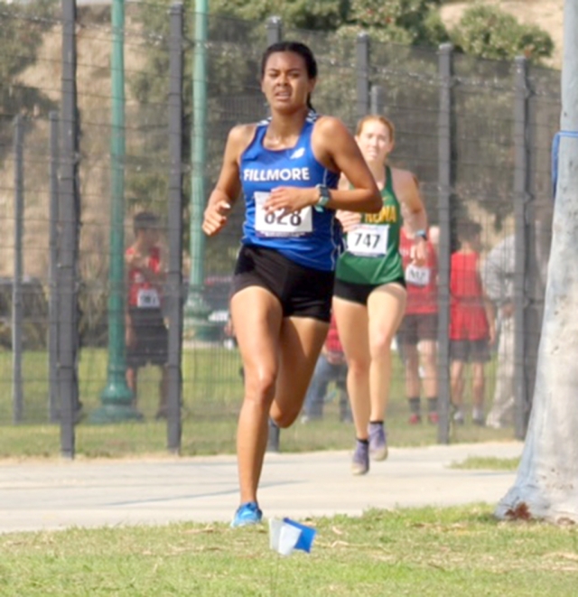 Varsity senior Alianna Tapia who led the girl’s team and finished in second with a seasons best time 18:48.36. Photos courtesy Michael Torres.