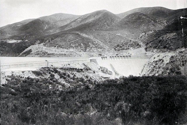 Above is the St Francis Dam a few days before the collapse took place on March 12, 1928. March 12 and 13, 2023 will mark the 95th anniversary of the St. Francis Dam Disaster. On March 11th at 1 pm there will be a presentation about the dam collapse at the Fillmore Historical Museum Depot. Admission is $5 for non-Members. Museum Members and children under 12 are free. John Nichols who wrote a book about the dam will also be there to talk about how he came to write the book. For tickets, go to www.fillmorehistoricalmuseum.org/event-details/st-francis-dam-disaster-a-look-back-95-years. Photos courtesy Fillmore Historical Museum.