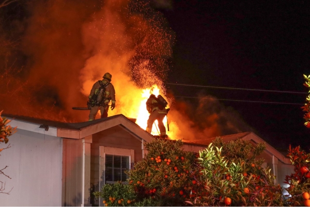 On Friday, April 19, at 9:21 p.m., Ventura County Fire Department, Fillmore City Fire, and Ventura City Fire Department responded to a structure fire in the 2200 block of Grand Avenue. Arriving firefighters reported a single-story residential structure with smoke and flames coming out from the roof, indicating a working fire. The fire was knocked down by firefighters within over 30 minutes. A Ventura County Fire Department investigator was dispatched. Cause of the fire is being investigated. Photo credit Angel Esquivel-Firephoto_91.