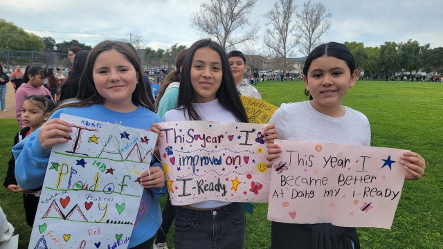 On Friday, February 23rd, 2004, Mountain Vista Elementary celebrated student success with their 3rd Annual Student Success Parade. Each student was recognized for their achievements that ranged from perfect scores on tests to being a good friend to others. Mountain Vista Elementary Principal Christine McDaniels said, “We love to celebrate all of our students’ successes with their families and the community. Thank you to all of our families for coming out and supporting our students!” Courtesy Mountain Vista Elementary blog. https://www.blog.fillmoreusd.org/new-blog/2024/2/23/3rd-annual-student-success-parade. Right are some of the students holding up their work they shared with friends and family. 