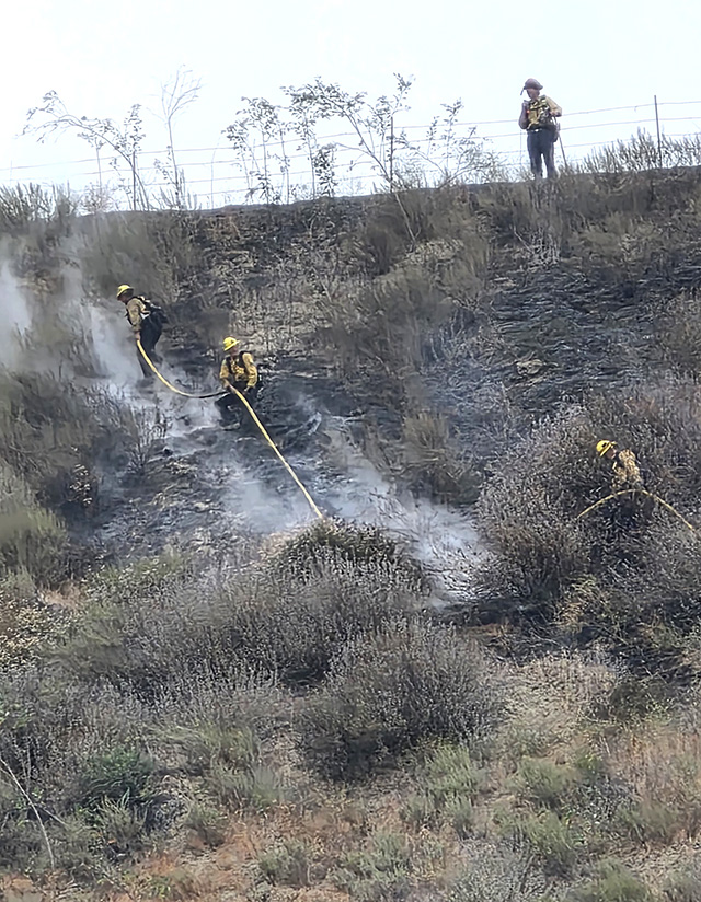 On Sunday, May 3, at approximately 6:00 a.m., there were multiple reports of a fire in the area of Center Street, Piru. Ventura County Fire was dispatched and found approximately two spot fires, each 100’x100’ moving at a slow rate of spread underneath power lines. A brush response was requested including LA County Fire, Ventura County Fire, Ventura County Sheriff’s Department, and the California Conservation Corps. Units on-scene noticed power lines down in the area and performed proper mitigation. They were able to make good headway and knock-down the fire by approximately 8:30 a.m. and stayed on-scene to mop up the fire. Final approximate size was roughly six acres; investigations are reportedly underway. Photo credit Sebastian Ramirez.
