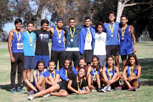 Flashes Cross Country 37th Annual Mt. Carmel /Movin Shoes Invitational. (l-r) Boys: Nick Villela, Everardo Garcia Magana, John Chavez, Sergio Perez, Michael Sanchez, Jonathan Ordaz, Juan Ramirez, Johnny Martinez and Adrian Orozco. Girls: Lauren Magdaleno, Carissa Rodriguez, Jackie Chavez, Arielle Estrada, Anahi Pascual, Nicole Gonzalez, Vanessa Avila and in front Diana Perez.