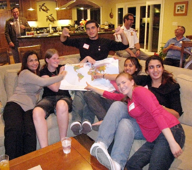 (left to right on couch):  Wafa Munif, 53, YES Program staff from Saudi Arabia; Anne from Denmark, a sophomore at Rio Mesa High; Heja, a Turkish YES student and senior at Moorpark High; Shervina, a Filipino YES student and senior at Fillmore High; Nur from Turkey, a senior at Oxnard High; and Stephanie, an American AFS Student who studied abroad in Italy in 2006. These exchange students have been in the United States since August 2008 and will return home in June.  In the background are several adult volunteers with the local AFS chapter.