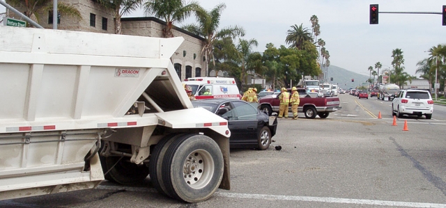 Firefighters worked quickly to clean up debris from the collision in order to re-open one of Fillmore’s busiest intersections.