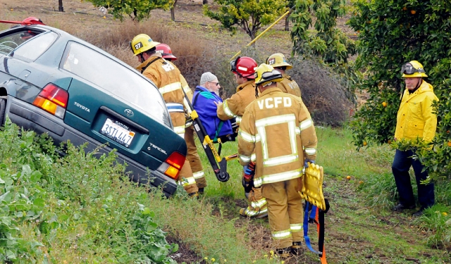A Toyota Tercel veered off Highway 126 near Cavin Road Wednesday about 10 o’clock. It appeared that the driver over corrected on the rain drenched road, swerved over the curb and landed in the middle of the berm. No one among the driver and two passengers was reported injured. Each was removed by Fillmore and County fire department personnel, with an elderly man carried to an awaiting ambulance by wheelchair. The vehicle was secured from further slippage and did not appear to suffer any significant damage.