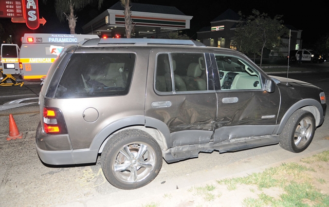 The eastbound SUV turned in front of the westbound Mazda Miata. No serious injuries were reported. Significant damage was done to the Miata, moderate damage to the SUV.