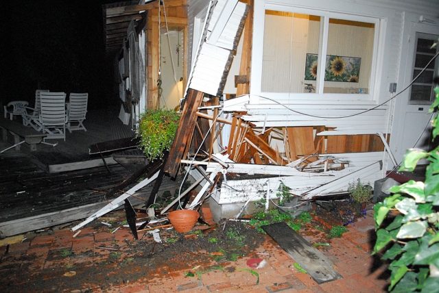 John Brothers took an unexpected ride down a steep cliff at the rear of his residence on Cliff Drive Tuesday
evening. According to reports, Mr. Brothers accidentally stepped on the accelerator instead of the brake when driving into his front parking area. Significant damage was done as the car with passenger passed between the garage and the house before dropping approximately 100 feet. Both Brothers and his passenger were able to walk back up to the house before County and City Fire Departments and Sheriff Deputies responded. The condition of driver and passenger was unknown at press time.