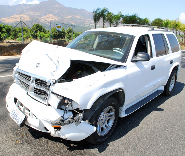 This accident site, on a broad curve, has been the scene of many such collisions in the recent past.