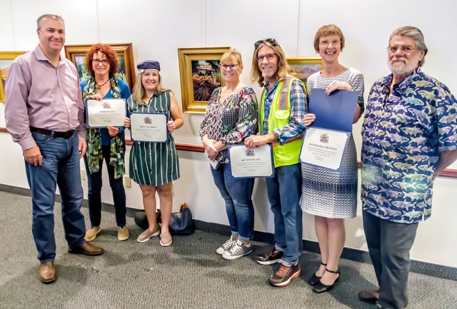 Fillmore Art & Photography Exhibition Curator Award winners (l-r) Fillmore City Manager David Rowlands, Lois Freeman-Fox-3rd place, Lisa Manony-Best of Show winner, Mayor Diane McCall, Paul Benavidez-2nd place, Lia Verkade-honorable mention, Richard Franklin-show curator.