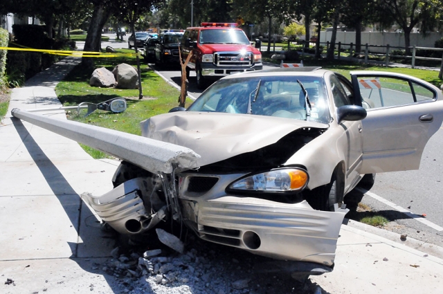 There was major damage to the vehicle, tree and light pole. No injuries were reported at time of incident.