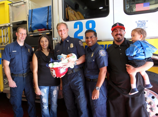 Michael came into the world on March 22, 2014 – and he arrived in a hurry. His parents Vanessa and Brenden were in route to the hospital, but Michael wouldn’t wait. VCFD dispatchers directed the couple to the closest fire station, Station 28 in Piru. Michael was born at 11:06 a.m. in the office at Station 28. Today, the entire family met the firefighters who delivered Michael and watched as they were awarded with “stork” pins signifying they had delivered a baby. Everyone at the Ventura County Fire Department wishes Michael a long, happy, healthy life. Photos courtesy Sebastian Ramirez. 