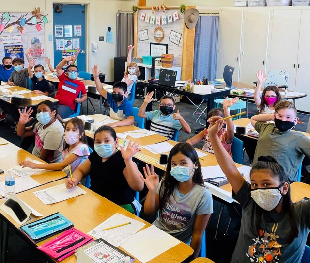 Students at San Cayetano Elementary are excited to be back to in the classrooms. Pictured are student wearing their masks and waving as they smile for a photo. Photos courtesy San Cayetano School Website.
