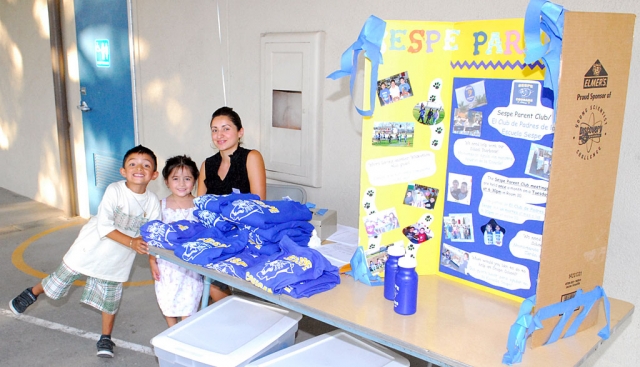 Back to School Night at Sespe School was well attended by parents and students. Shown is a table selling t-shrits and water bottles for the Sespe Parent Club.