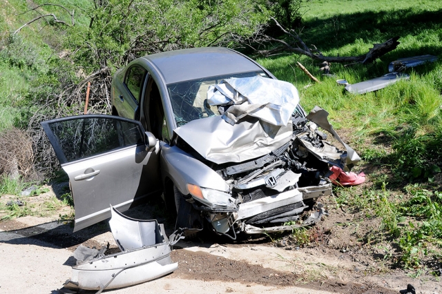 On Thursday, March 14th at 2:08 p.m., a Sakaida & Sons semi-truck and a silver Honda sedan collided going around a bend on Balcom Canyon Road south of South Mountain Road.