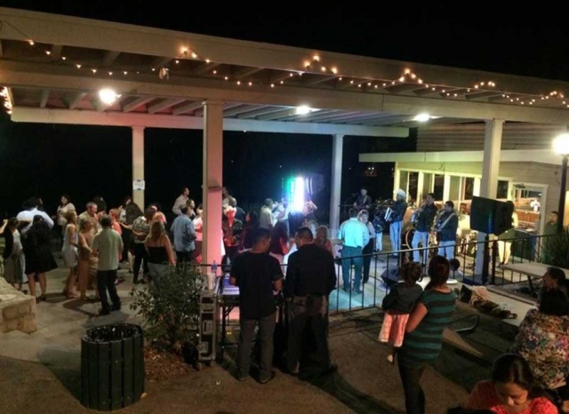 Hermanos Herrera play to a happy crowd at Elkins Ranch Golf Course, Friday night. The group has established themselves as the future of Regional Mexican music.