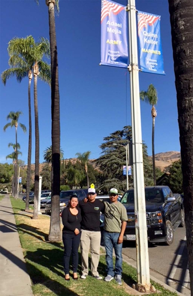 A New Military Banner was installed for Adael Mejia (center) representing the US Army along with his parents Adrian Mejia Hernandez and Laura Mejia. Photos courtesy Virginia De La Piedra.