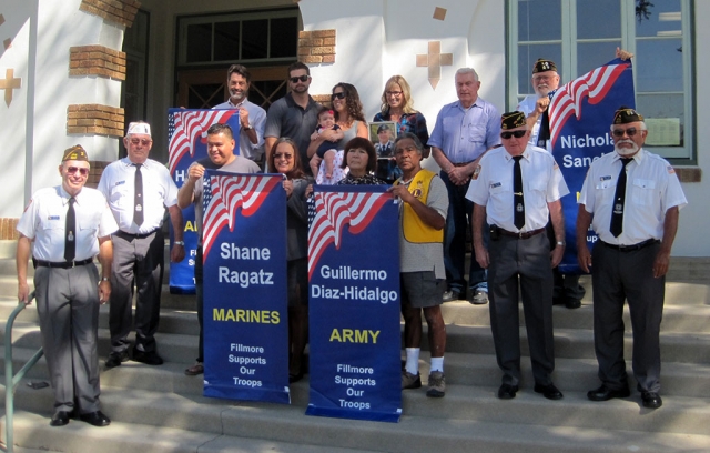 On Thursday, August 21st new military banners were replaced in front of the Fillmore Unified School District. Veterans and family of our hometown military personnel came together for the installations. Photo courtesy Rigo Landeros.
