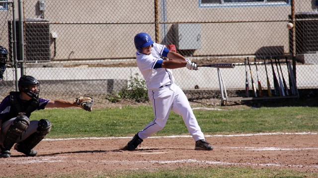 Nathan Ibarra hits the ball against L.A. Baptist. Ibarra also came in and relieved pitcher Tim Medina after
5 1/3 innings, and pitched 1 2/3 innings.