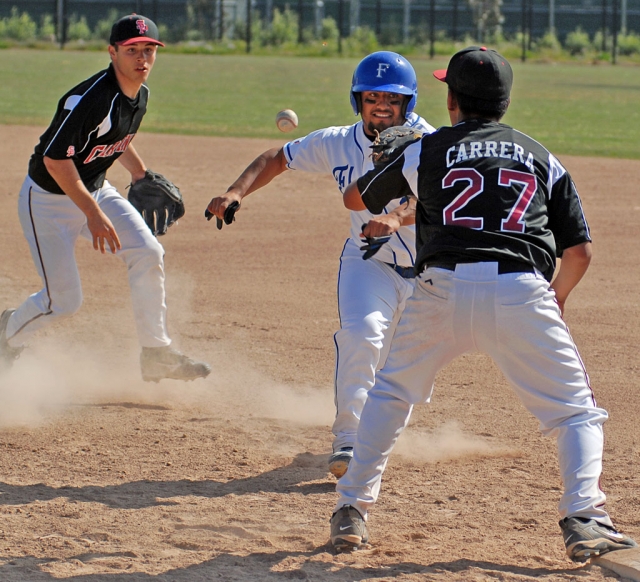 Sal Ibarra above runs back to the base to avoid an out. Fillmore played Santa Paula Wednesday, April 7th. Fillmore beat Santa Paula 4-3. Tim Medina (record 2-2) was the winning pitcher. Medina pitched 5 innings allowing 3 runs. Cody Farrar finished allowing only one hit. Christian Conaway was 2 for 3. Farrar hit a double. On April 9th, Fillmore played Santa Paula, Fillmore came out on top 11-4. Tanner Carpenter (record 4-2) was the winning pitcher. Carpenter pitched 5 innings allowing two runs. Garrett Reilly finished the game. Conaway was 3 for 3, Sal Ibarra was 3 for 3 with a double, triple and 2 RBI’s. Fillmore’s record 7-6. League 1-3.